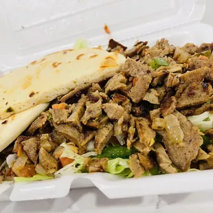 a close up of a food item in a styrofoam container