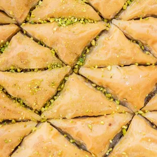 a close up of a tray of baklaa