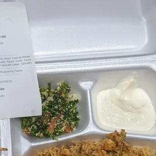 a meal in a styrofoam container