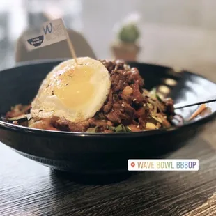 a bowl of food on a table
