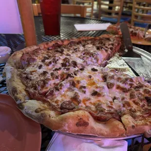 Veggie haters pizza.   Loaded with meat and 100% delicious!!  Will not disappoint.