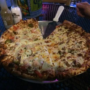 the pizza over all was above average. the pizza has real cheese which is a plus. we had port authority shrimp: not very good.