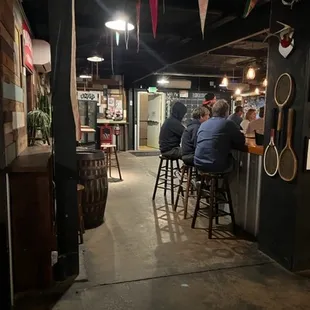 people sitting at the bar