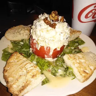 Chicken salad stuffed in a tomato.  Served with foccacia bread at Waverly Cafe in Waverly, TN