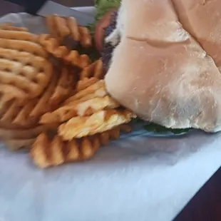 1/2 pound burger and crispy waffle fries