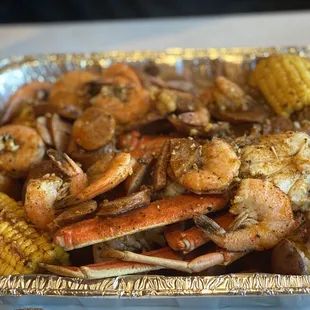 Boil with crab, headless shrimp, potato and corn on the cob