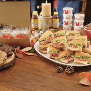 a platter of sandwiches on a table