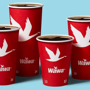 a group of red cups with white birds on them