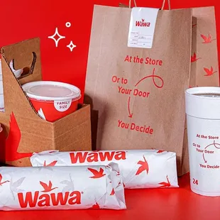 a variety of paper cups and paper bags