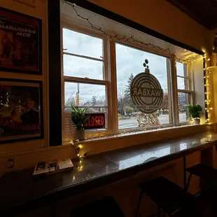 a view of a window and a bar