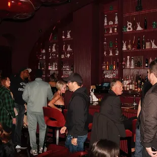 a group of people in a bar