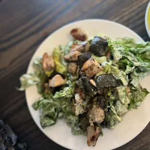 a plate of salad on a table