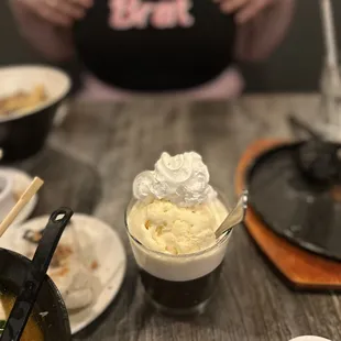 a woman sitting at a table