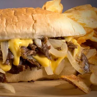 a cheeseburger and potato chips