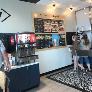 customers waiting in line at the counter