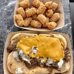 CHEESY BACON RANCH CHEESESTEAK (They forgot the bacon?)  TATER TOTS (Extra Crispy)