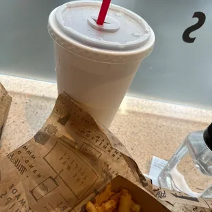 Soda, CHICKEN TENDERS and fries