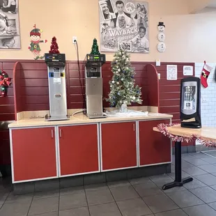 a kitchen with a christmas tree