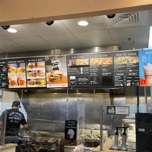 a man working behind the counter