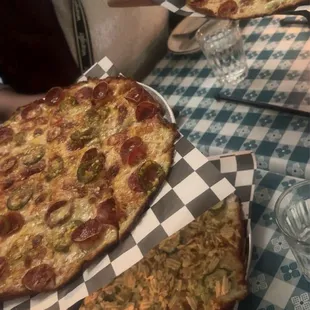 Pepperoni deluxe, pickle pizza, and byo