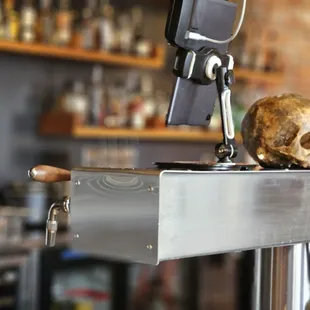 a skull on a bar