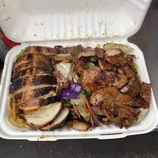 Two meat plate with yakisoba noodles and veggies.  Chicken and Honey Lemongrass Pork
