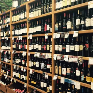rows of wine bottles on shelves
