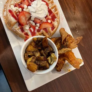 Strawberry white chocolate (wayne signature waffle) with potatoes and chicken wings