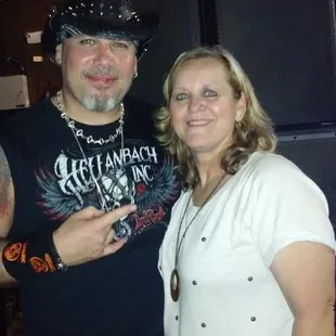 a man and woman posing for a picture