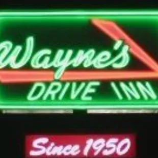 a neon sign for wayne&apos;s drive inn
