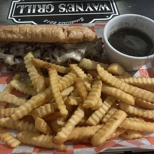 French Dip Grilled sliced sirloin and melted cheese jammed in a roll with house made au jus 9.99