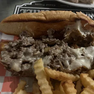 French Dip Grilled sliced sirloin and melted cheese jammed in a roll with house made au jus 9.99