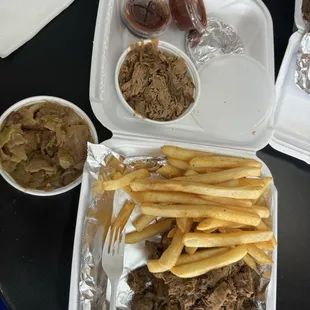 Burnt ends, pulled pork, fries, cabbage, and a cookie.