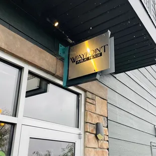 Entrance to the restaurant which is located in an apartment complex