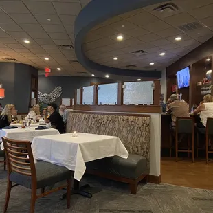 dining area with tables and chairs