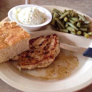 Marinated grilled chicken is sooo good! Some of the chicken is hiding under the cornbread. Green beans and potato salad.