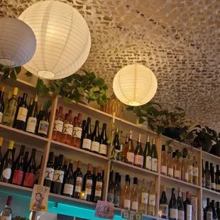 a variety of bottles of wine on shelves