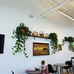 a little girl sitting at a table