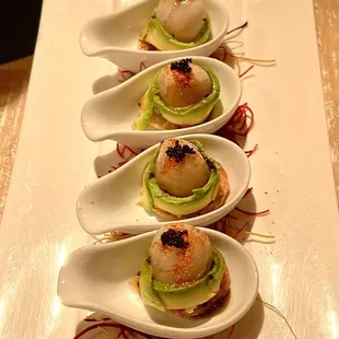 Tiger Eye was 4 bites of spicy tuna, shichimi togarashi, wasabi ponzu, avocado, and lychee (makes it sweet &amp; floral) $18.88   3*