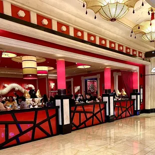 Located conveniently next to the Encore casino (SE corner where the hallway to Wynn starts). Can see their crystal dragon along their wall.