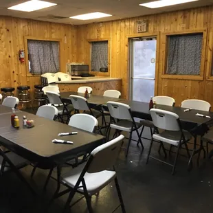 tables and chairs in a room