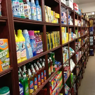 a shelf full of cleaning products