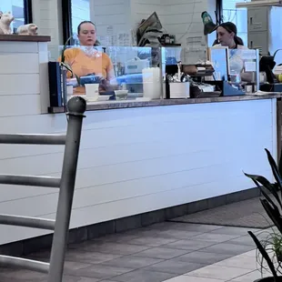 Social media influencers and health code violators. There's a phone in that hand with the glove/handling food and another on the counter.