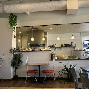 a view of a kitchen and dining area