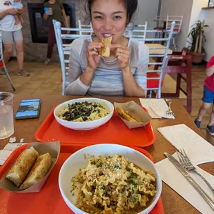 a woman eating a meal at a restaurant