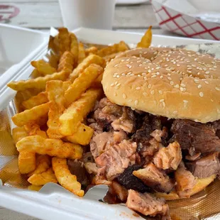 Chopped brisket sandwich and fries