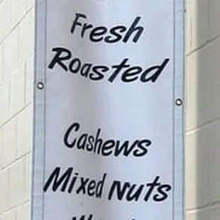a banner hanging from the side of a building