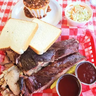  a plate of ribs and sides