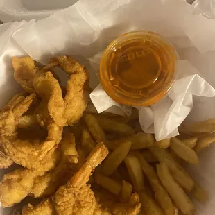 Shrimp and fries. Side of mild garlic sauce