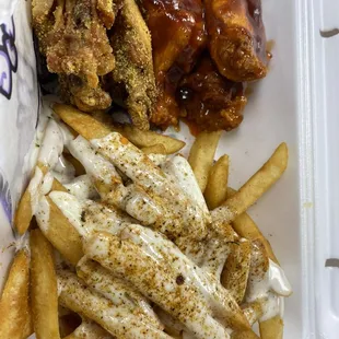 chicken wings, fries, and coleslaw